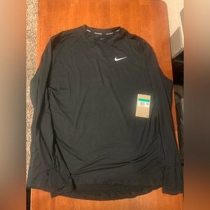 Women’s Nike Dri Fit shirt brand new with tags size XL $25